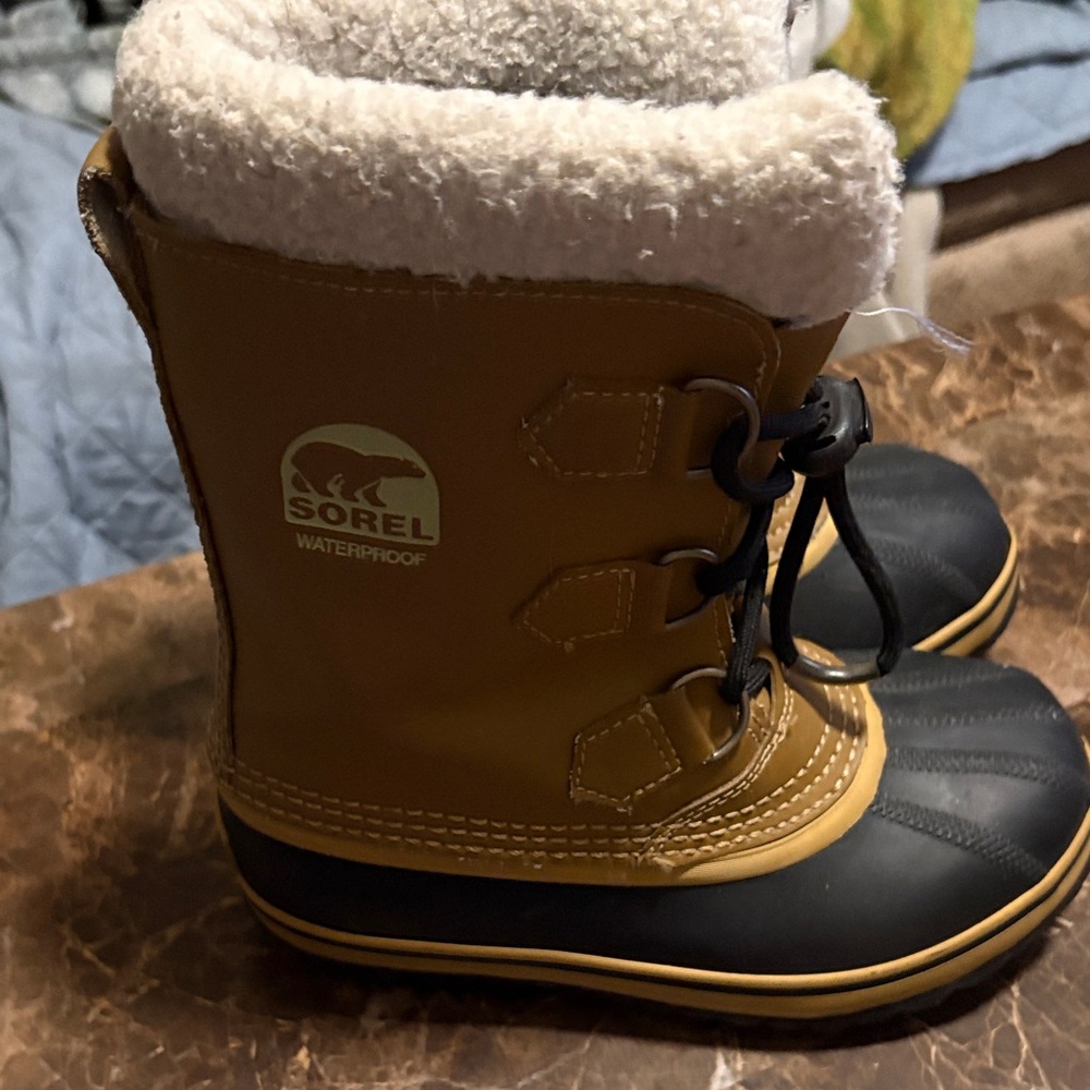 Sorel Tan and Black Insulated Boots